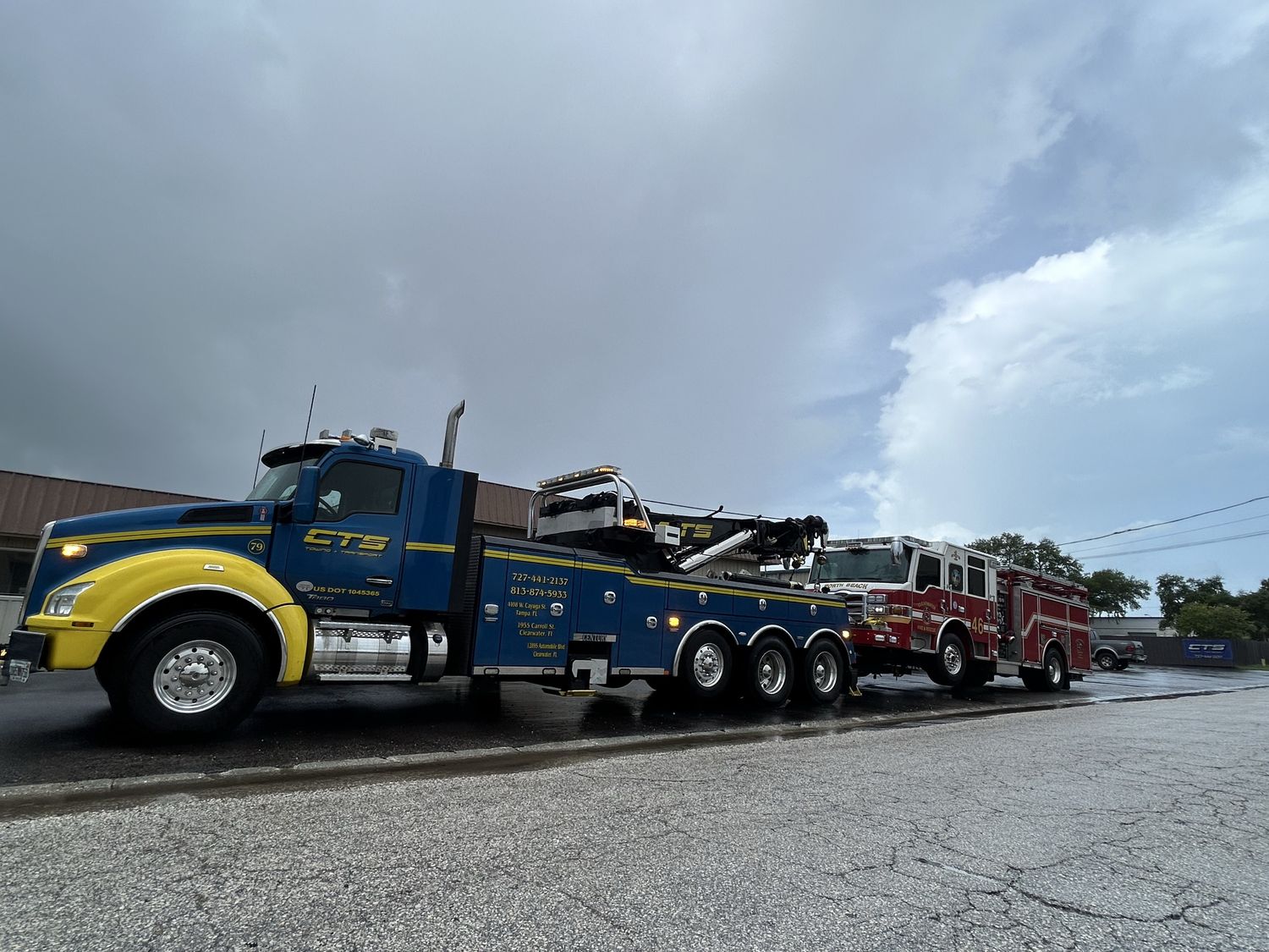 CTS heavy wrecker towing a fire engine