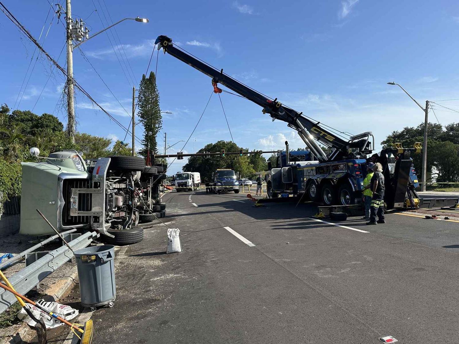 CTS recovery crew working an overturned concrete truck
