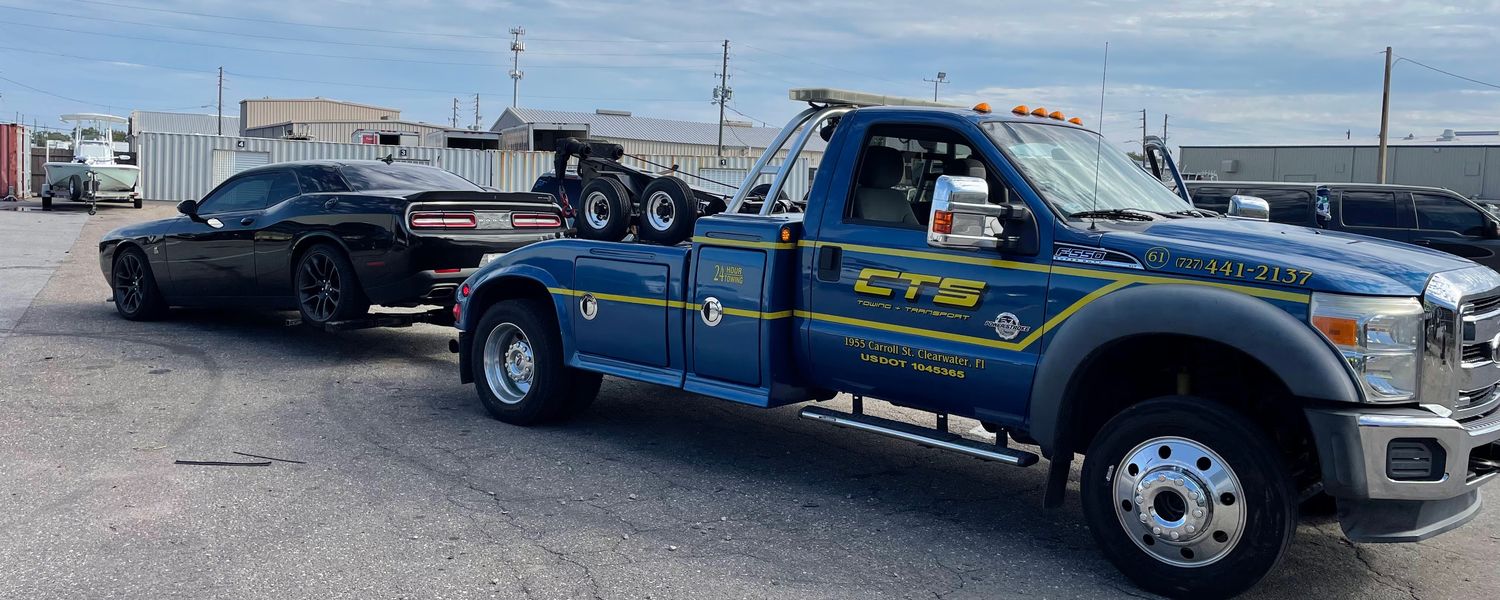 CTS self-loader with a vehicle at the secure impound yard